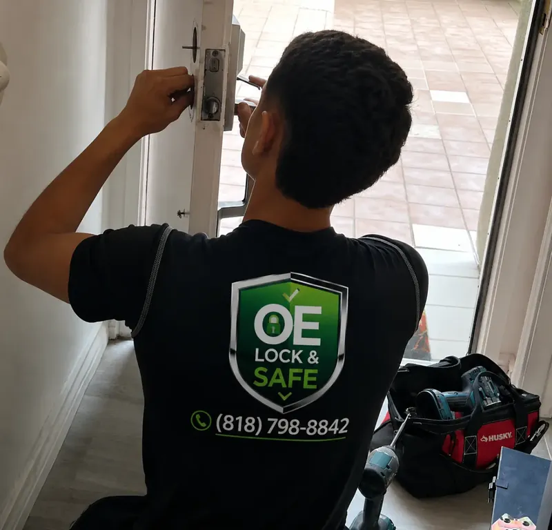 OE Lock & Safe technician opening a locked residential front door in the Los Angeles area