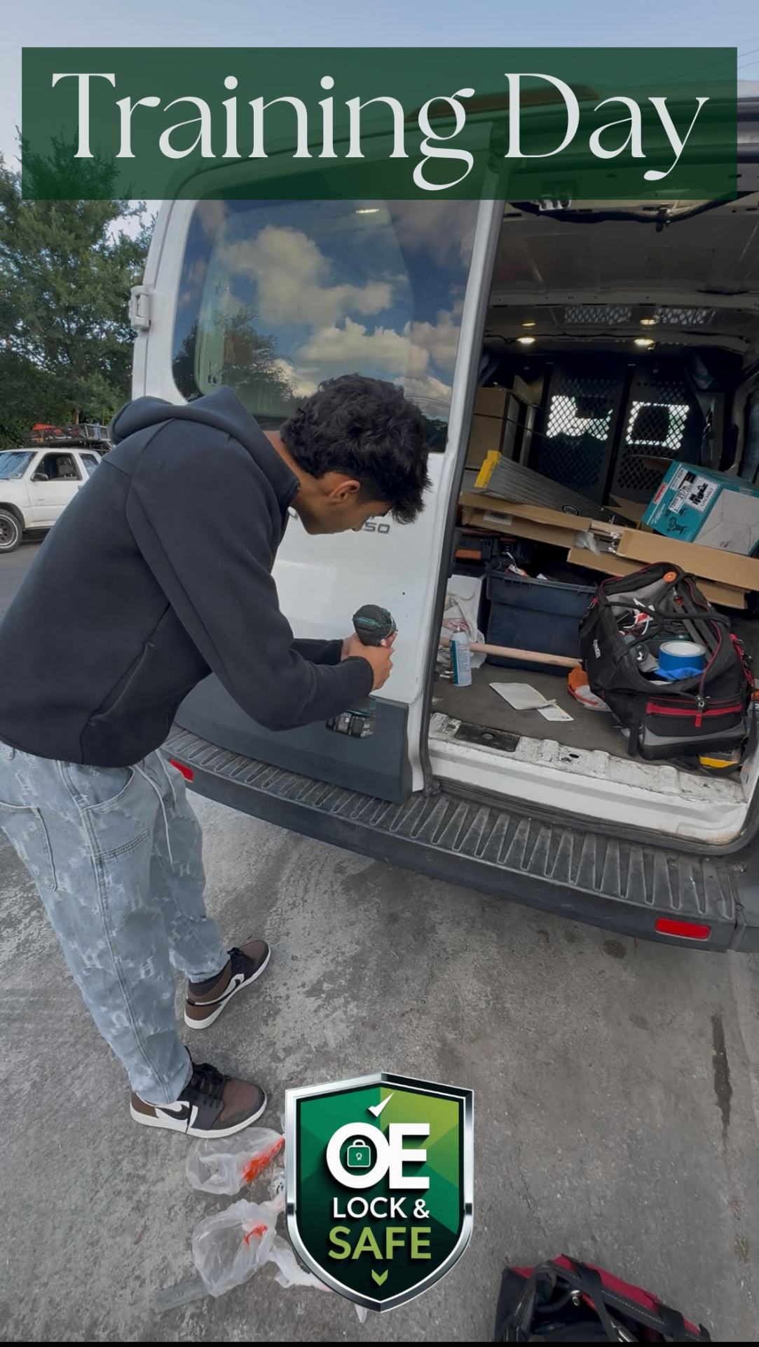 Technician during OE Lock & Safe training day beside the service van