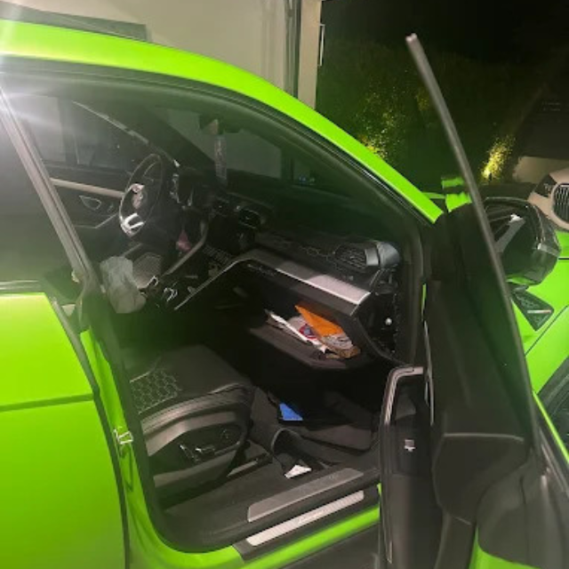 Lamborghini Urus driver door opened during an exotic car lockout