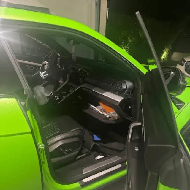 Lamborghini Urus driver door opened during an exotic car lockout